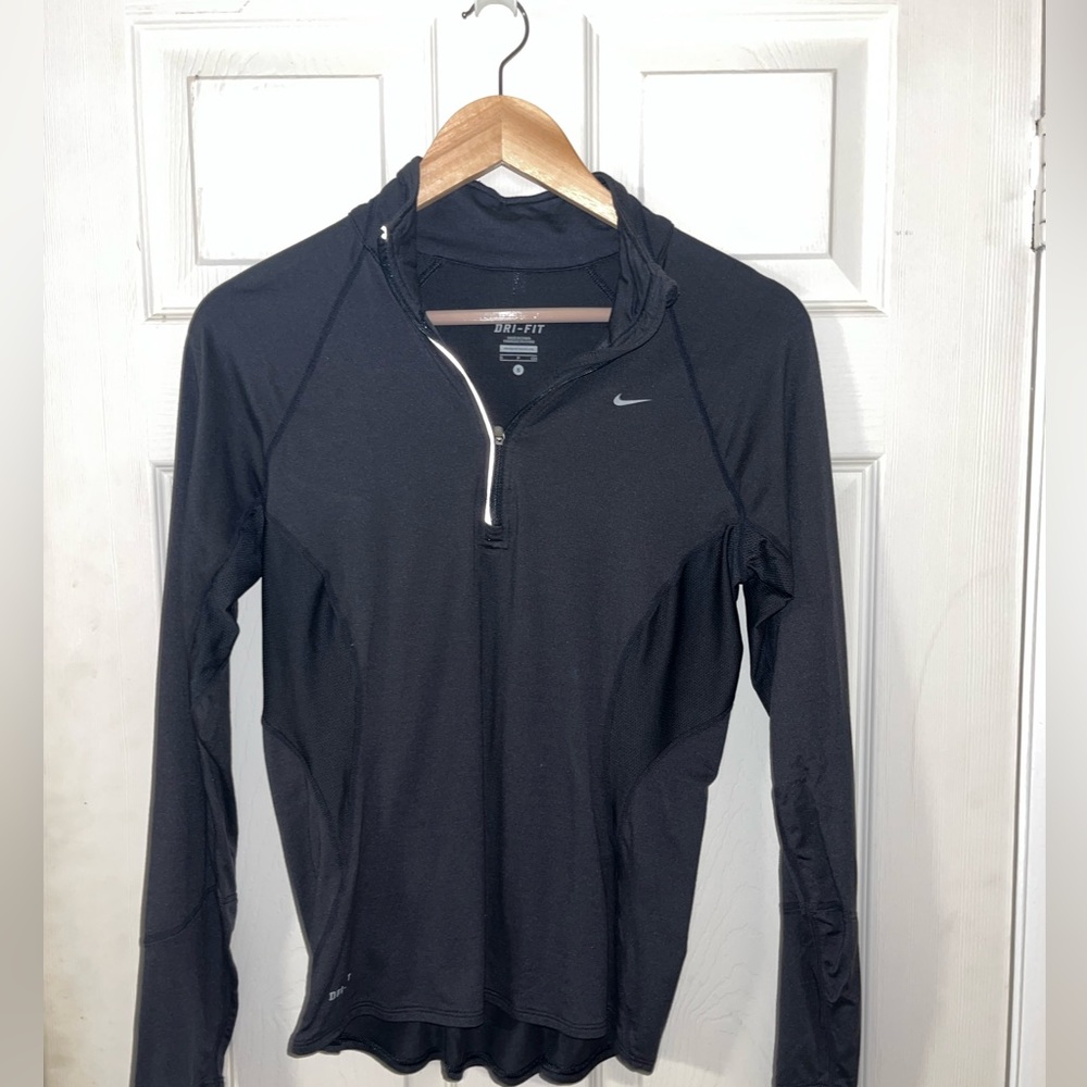 Charcoal, gray Nike pull over